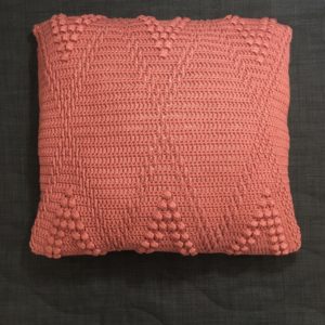 crocheted cushion cover